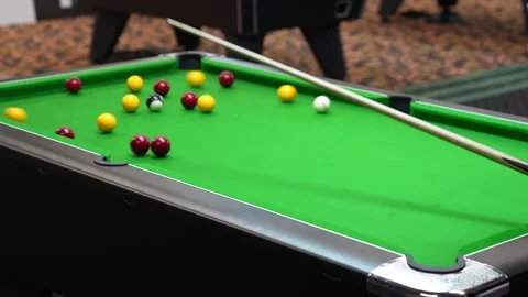 Successful break of blackball Pool balls on a green pool table Stock Footage 297807152
