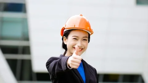 Successful business girl lifted her finger, saying great.Hand like symbol Stock Footage