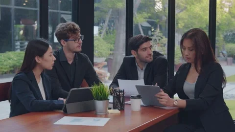 Successful business professionals presenting analytical report Stock Footage 147655415