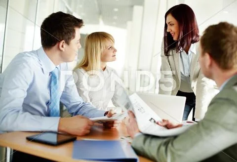 Successful business team holding a meeting to discuss the latest news Stock Photos