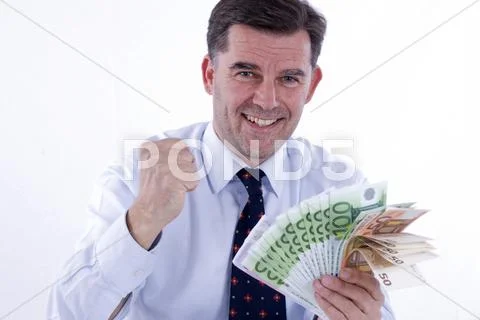 Successful businessman, 50 +, holding banknotes Stock Photos