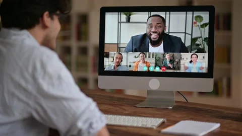 Successful caucasian young man talking on video conference with colleagues of Stock Footage 168476899