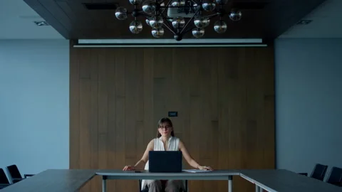 Successful ceo looking computer in conference hall. Office manager solve problem Stockbeeldmateriaal 200010376