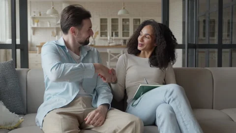 Successful Collaboration: Smiling Partners Shaking Hands After Agreement At Home 스톡 동영상 303758727