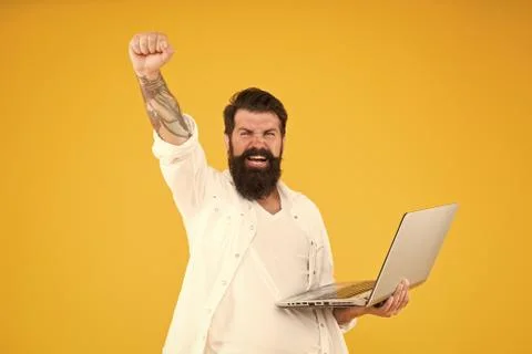 Successful developer. Bearded man with notebook. Online shopping. Programmer Stock Photos