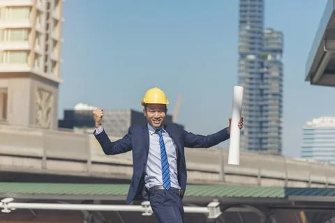 Successful engineer finishing project complete. holding fist and constructi.. Fotos de archivo