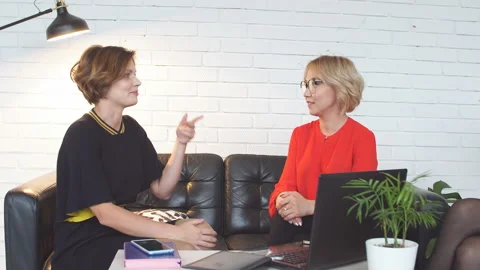 Successful female colleagues develop new project Stock Footage 99821859