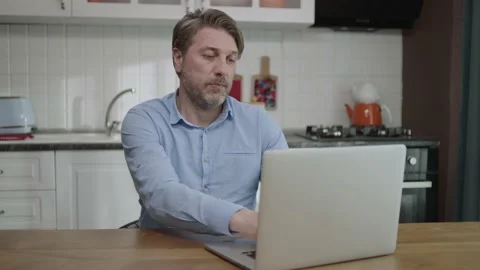 Successful freelancer typing email or message on keyboard on laptop Stock Footage 188928810