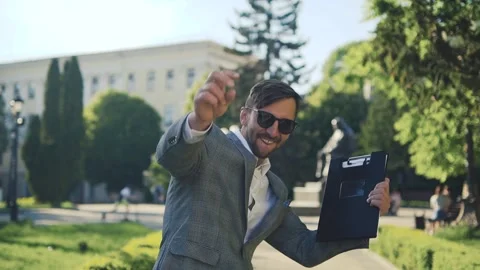 A successful guy is happy and gesticulating. Stock Footage 187021748