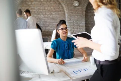 Successful happy group of people learning software engineering and business Stock Photos