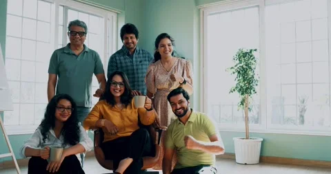 Successful Indian startup team in modern office, young entrepreneurs celebrating Stock Footage 342500813