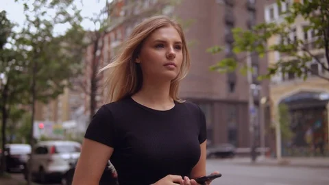 Successful lady texting message on smart phone Stock Footage 113466816