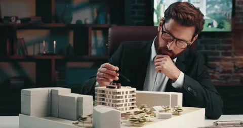 Successful man checking the layout of a ... | Stock Video | Pond5