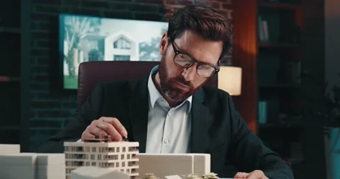 Successful man checking the layout of a ... | Stock Video | Pond5