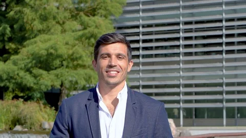 Successful man looking at camera, slow motion video portrait Stock Footage 96066804