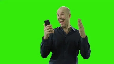 Successful man in suit is relieved after looking on his phone Stock Footage 166513140