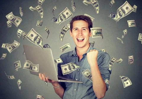 Successful man using laptop building online business making money Stock Photos