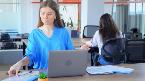 Successful manager in open space office worker in start up company Stock Footage 120742522