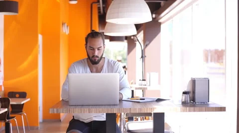 Successful manager working in cafe during break Stock Footage 67100140