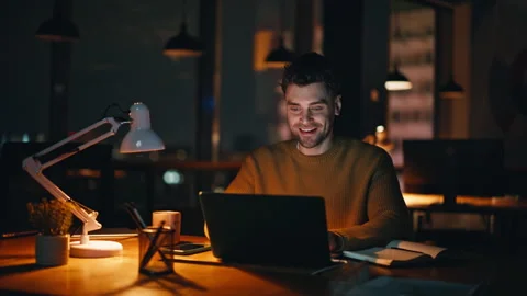 Successful manager working night creative agency office closeup. Smiling man Stock Footage 340114319