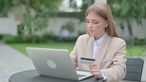 Successful Online Payment on Laptop by Young Businesswoman Stock Footage 156973353