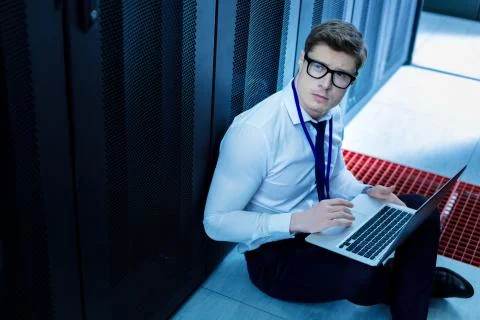 Successful operator working on his laptop Stock Photos