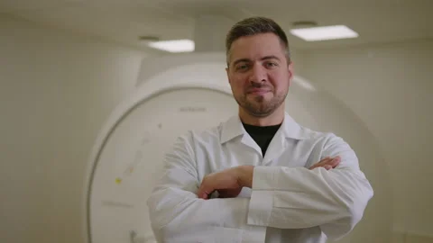 Successful radiologist doctor background of a computed tomography machine Stock Footage 207999640
