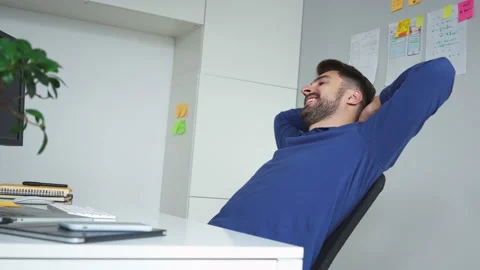 Successful software develeoper relaxing finishing programming task Stock Footage 162469204