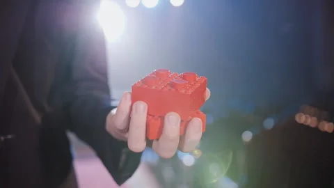 Successful Startup Founder Holding Final Product Piece on Stage Video stock 336197511