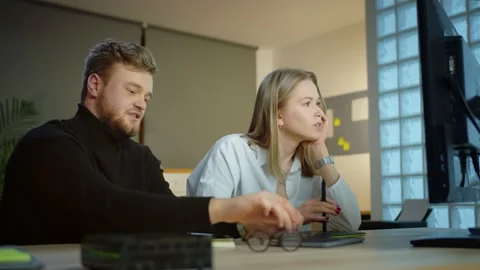 Successful startup project high five gesture of Caucasian colleagues working in Stock Footage 131550579
