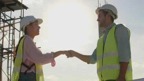 Successful team and professional engineer do handshake Stock Footage 146681051