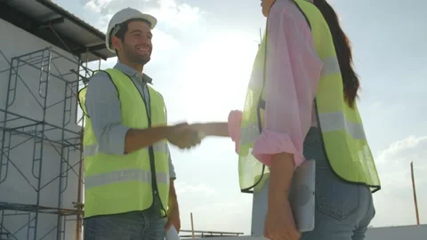 Successful team and professional engineer do handshake Stock Footage 146681058