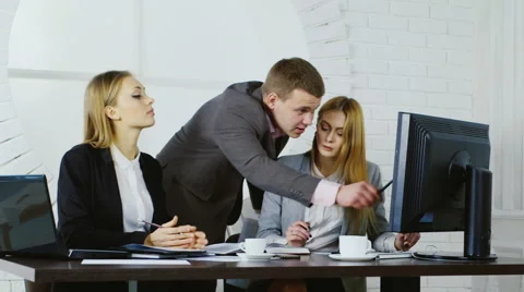 Successful team of young people working in the office Stock Footage 65566043