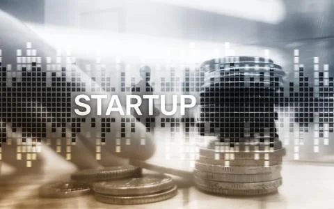 Successful teamwork and business startup concept. Inscription on the screen Stock Photos