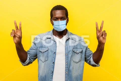 Successful winner. Portrait of excited man with smile with surgical medical m Stock Photos