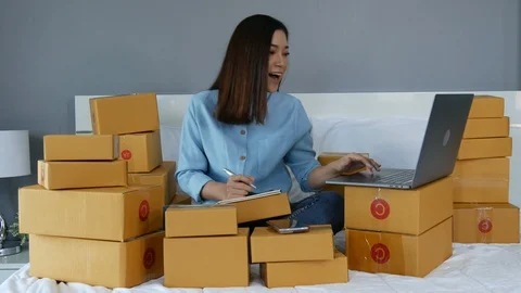 Successful woman working and using laptop computer to selling product online  Stock Footage 130102091