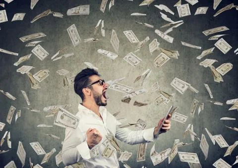 Successful young man using tablet building online business earning money Stock Photos