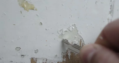 Successfully Removing Paint from Wall Detailed Closeup Action Shot Stock Footage 301543065