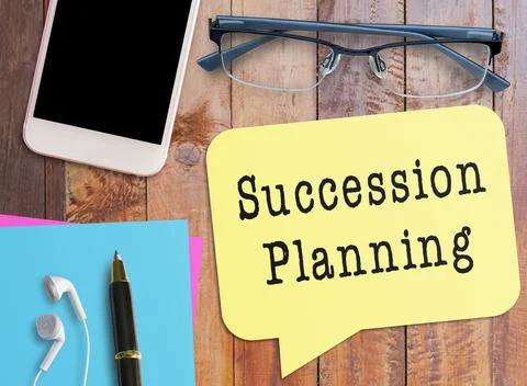 Succession planning text on notebook Stock Photos