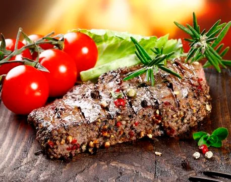 Succulent tender peppered steak Stock Photos