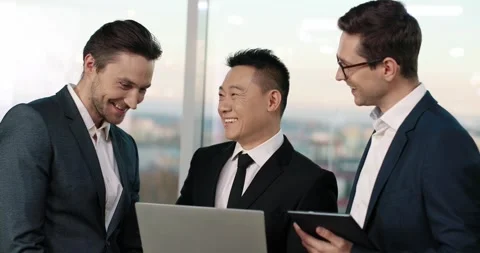 Sucessfull mixed-race managers having fun time during work. People with suits Stock Footage 244244039