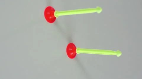 Suction Cup Toy Darts Hitting Wall Stock Footage 46800969