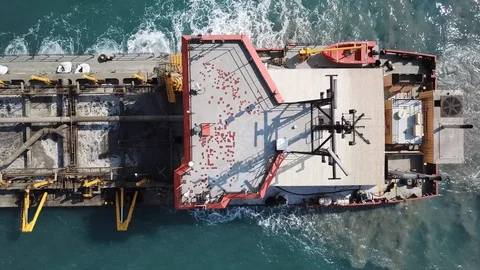 Suction Dredger ship working near the port - aerial 4k Stock Footage 111679682