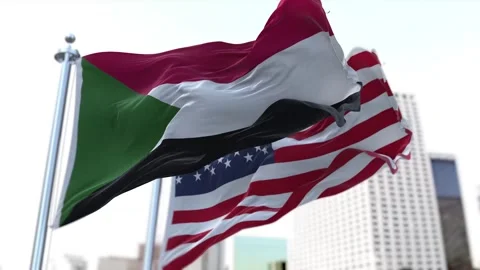 Sudan and United States Flags Waving on Flagpoles. Seamless Video stock 297385953