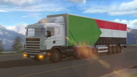 Sudan flag shown on the side of a large truck Stock Footage 122106107