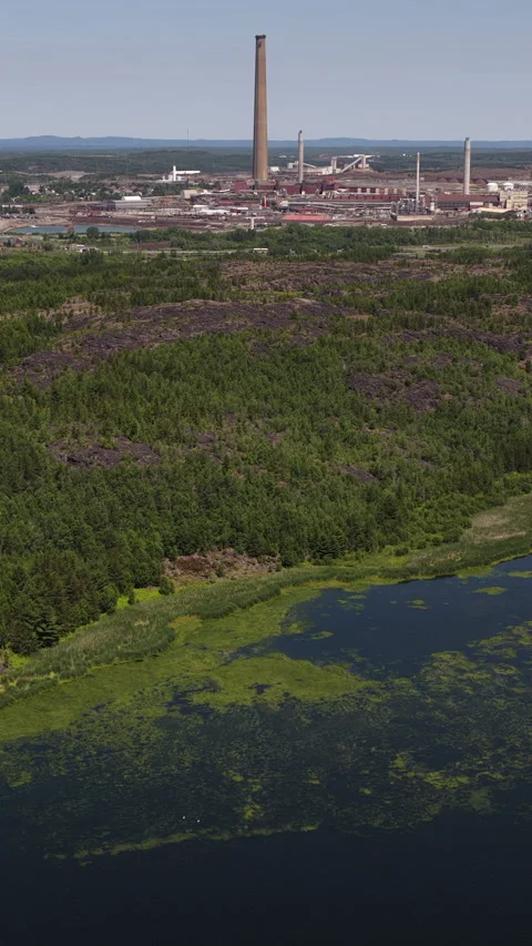 Sudbury mining smoke stack and surrounding area - industrial centre of nickel 動画素材 339815005