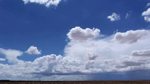 Sudden rainstorm advancing over desert, time lapse Stock Footage 81195360