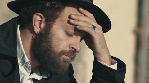 Sudden Sadness: Elegant Young Man Gripped by Bad News Stock Footage 261276198