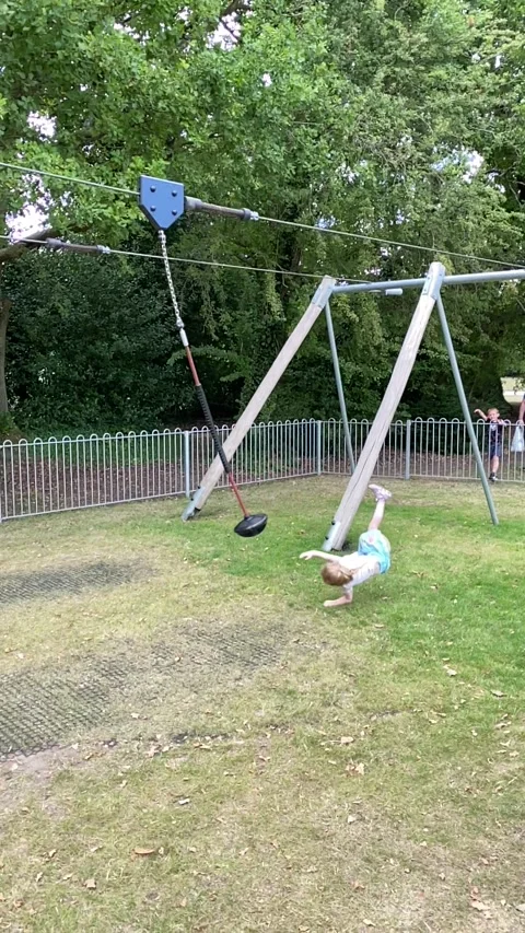 Sudden Stop on Zip-Line Sends Girl Flying, Camberley, England, UK - 01 Aug 2020 Video stock 205154644