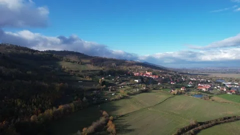 Sudetes mountains and farmfields during autumn - drone aerial footage Stock Footage 259407632